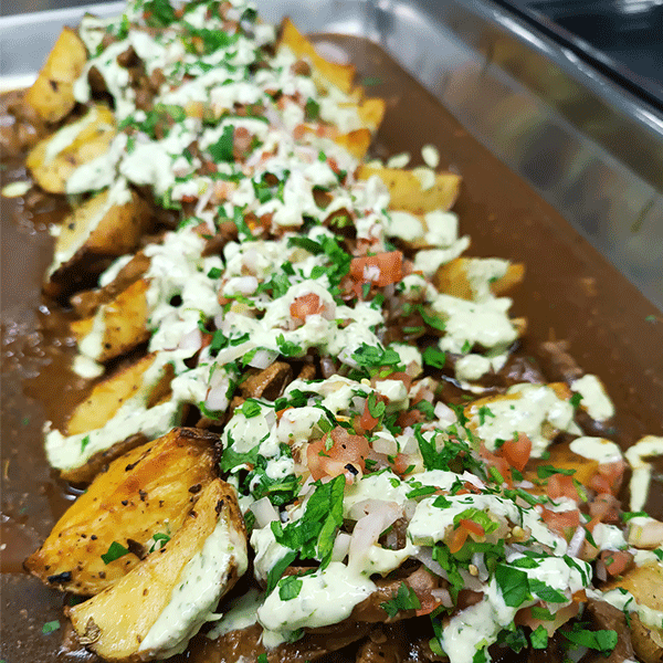 Lomo con papas rústicas