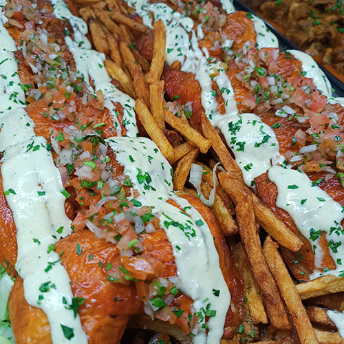 Muslo horneado en salsa de ajo